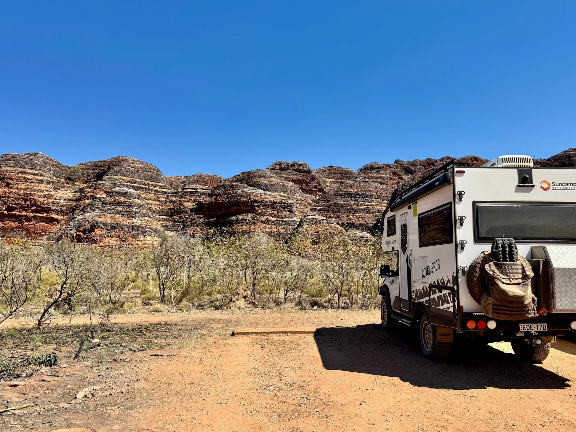Suncamper motorhome with the striped domes of the Bungle Bungles, Purnululu National Park, Western Australia