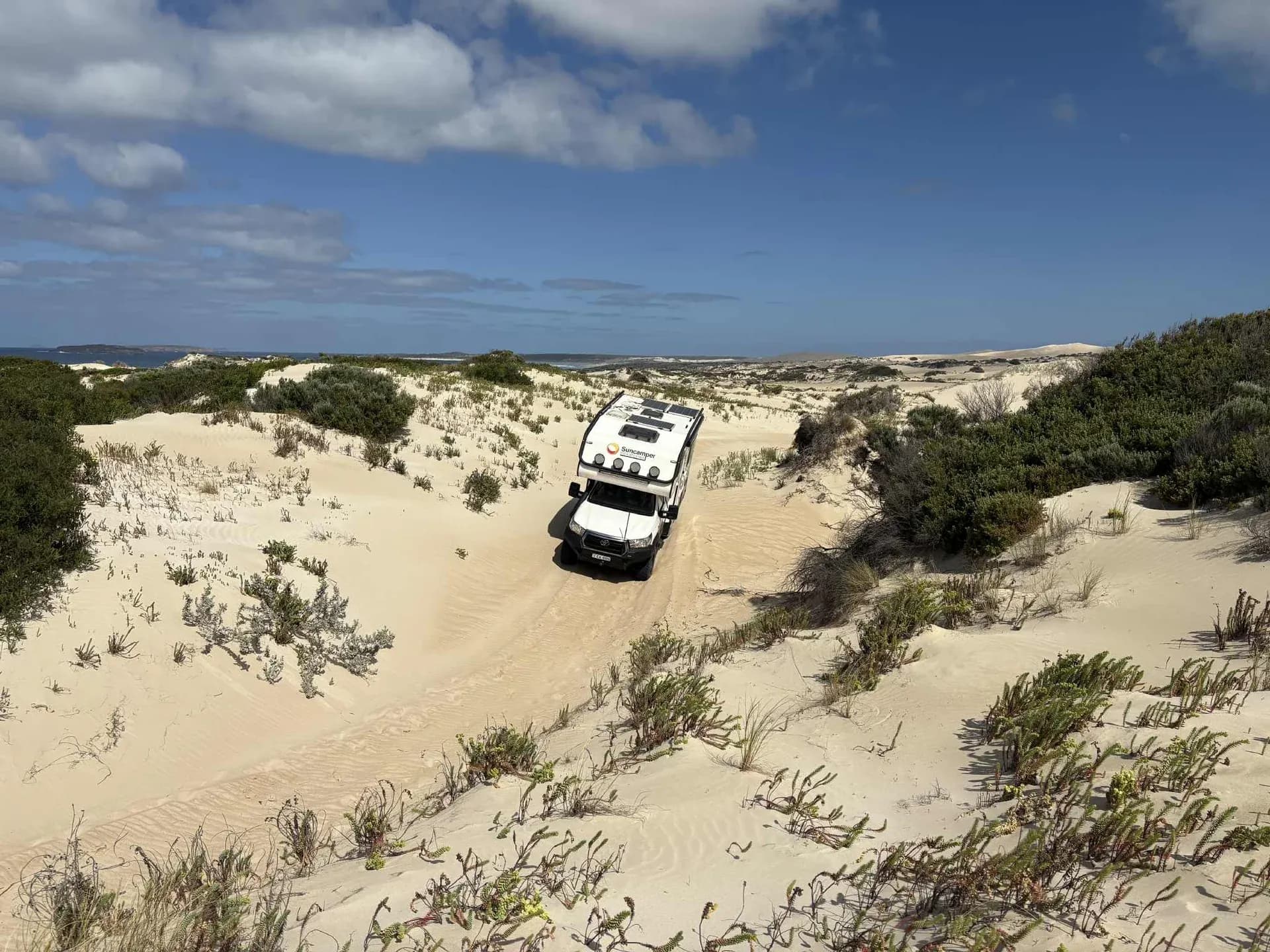 Suncamper on the dunes of Gunyah Beach in Coffin Bay National Park, South Australia