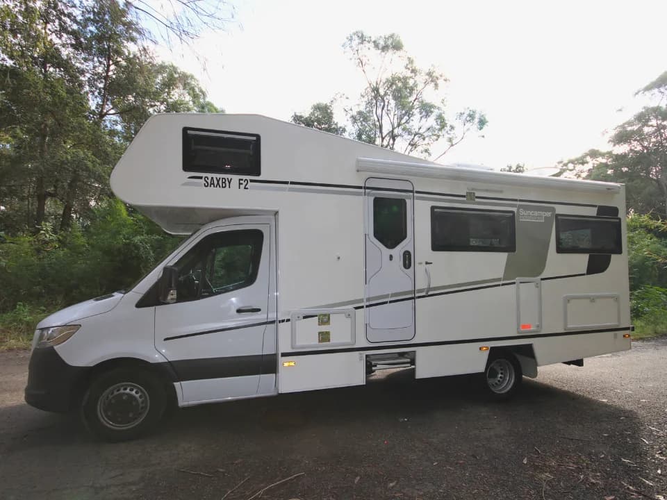Suncamper Saxby F-2 side profile on bush road — exterior