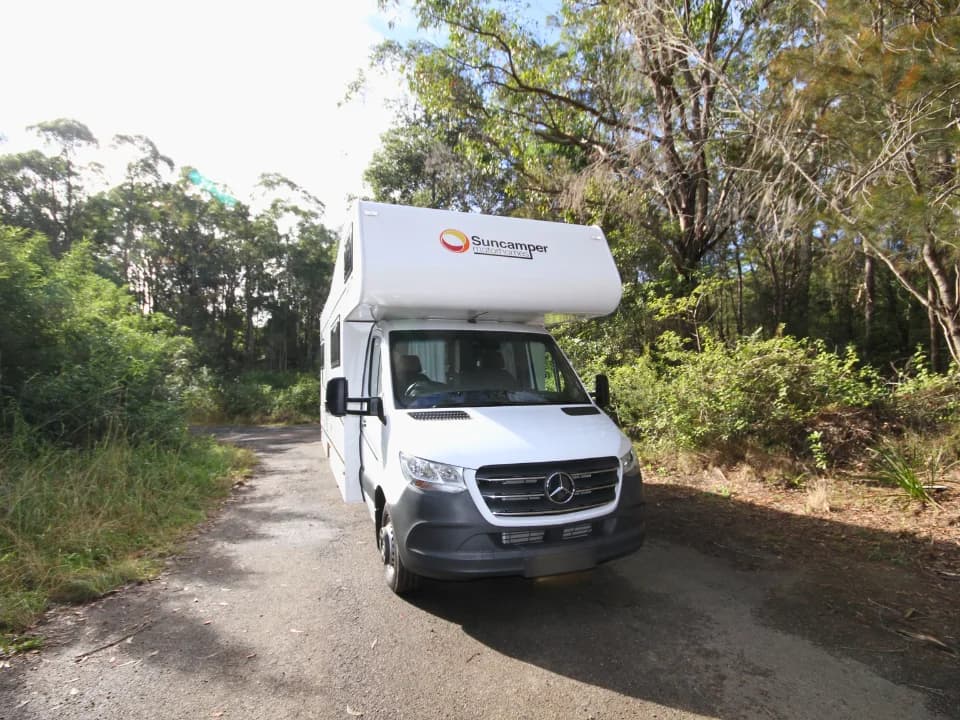 Suncamper Saxby F-2 front-facing exterior on bush road — exterior