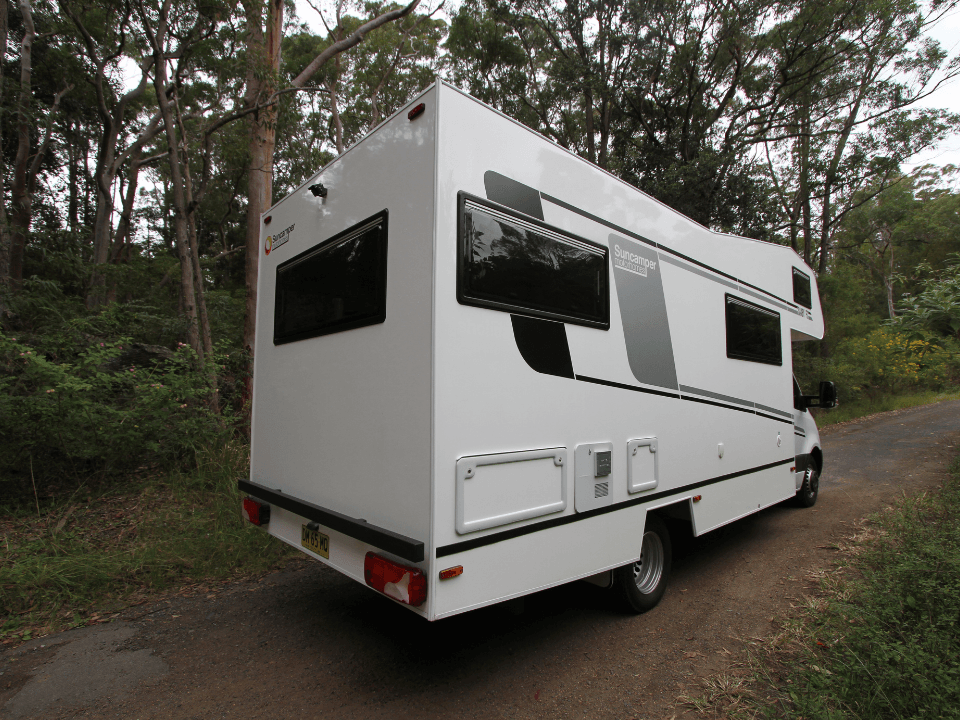 Suncamper Saxby F-2 drivers side rear quarter — exterior