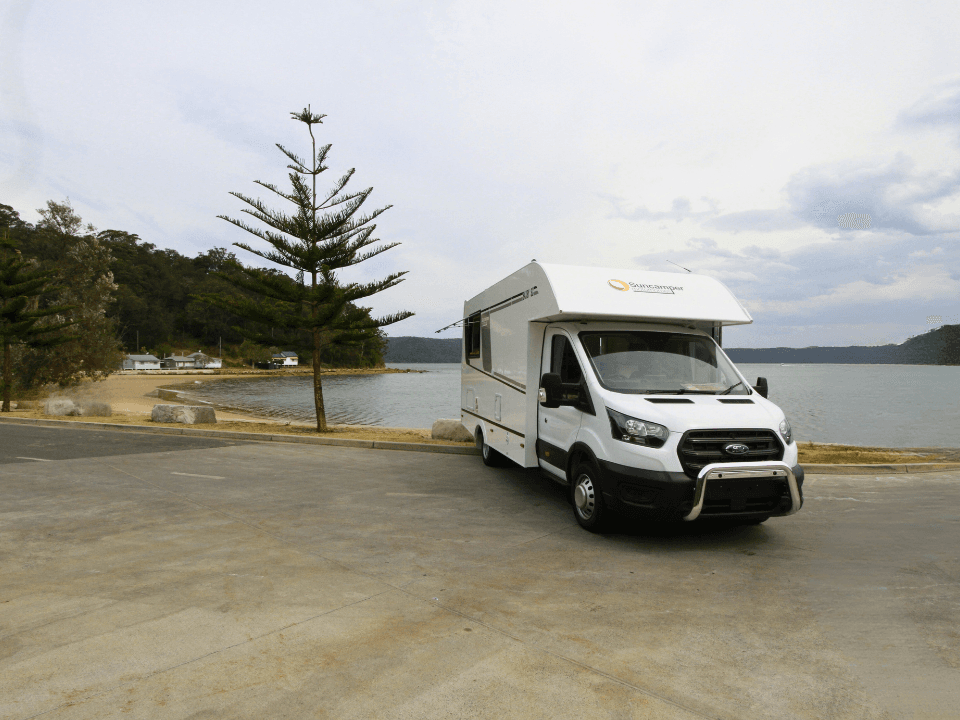 Suncamper Saxby S-2 drivers side front corner — exterior