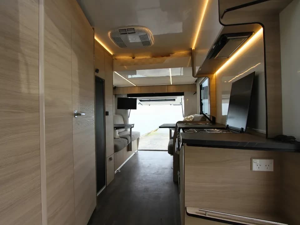 Suncamper Saxby S-2 interior with rear tailgate open — interior