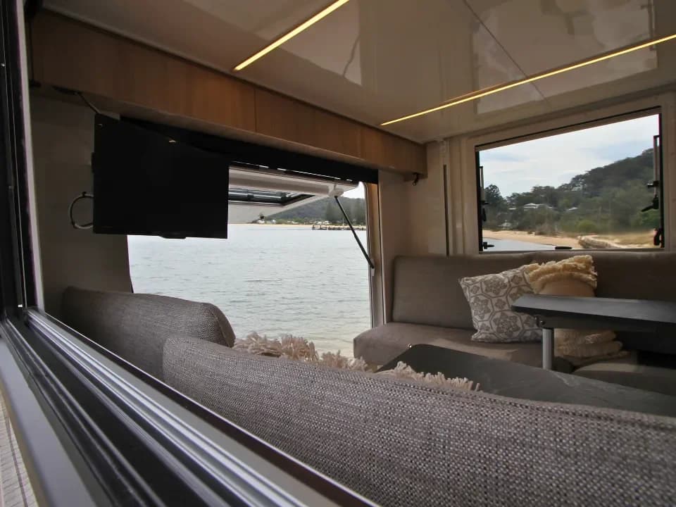 Suncamper Saxby S-2 cafe style seating with rear tailgate — interior