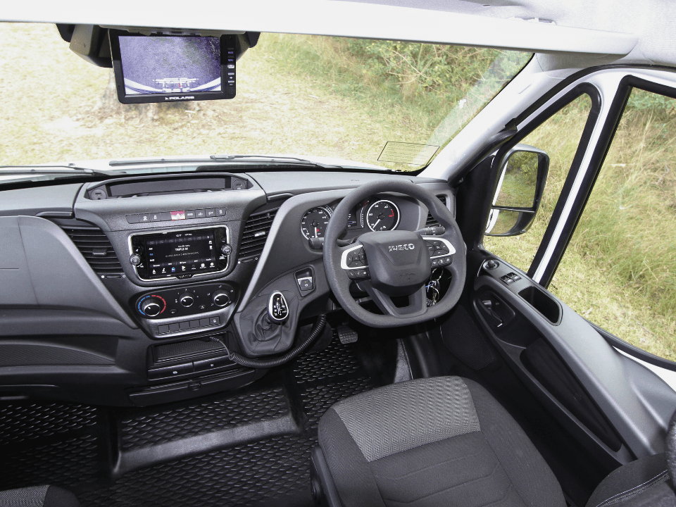 Suncamper Saxby V-2 walk-through cab interior — cab