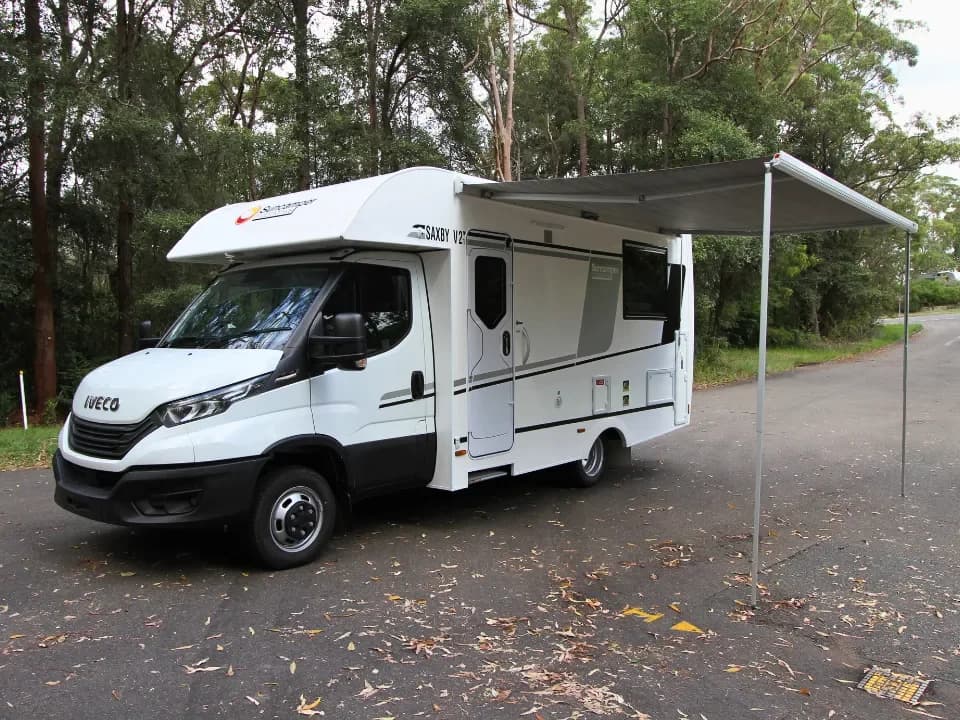 Suncamper Saxby V-2 passenger awning extended — exterior