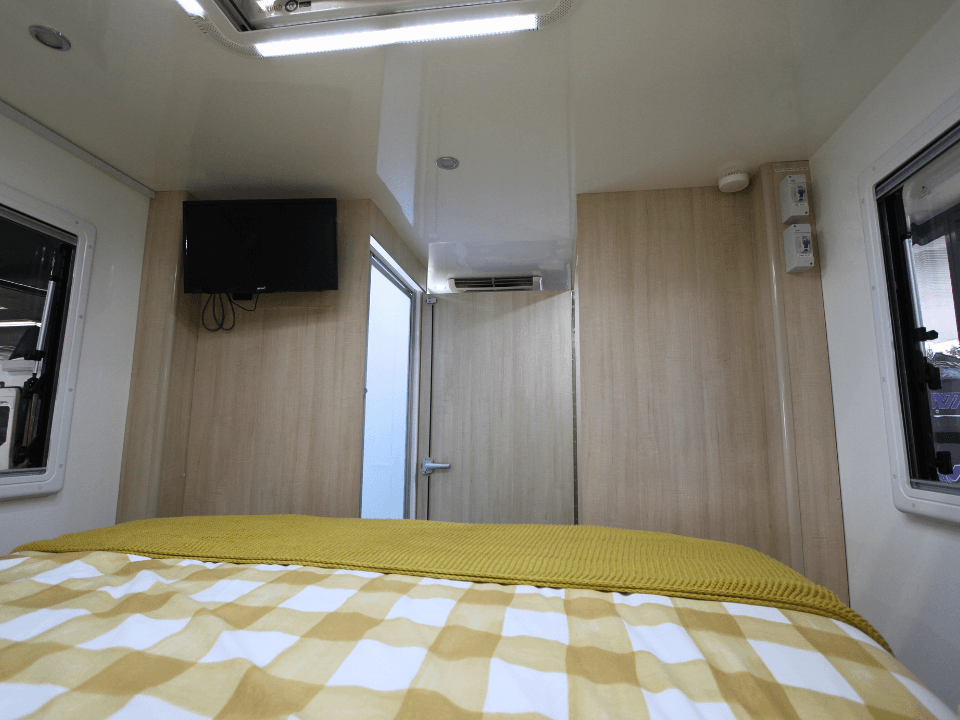 Suncamper Sovereign Q-2 bed area — sleeping