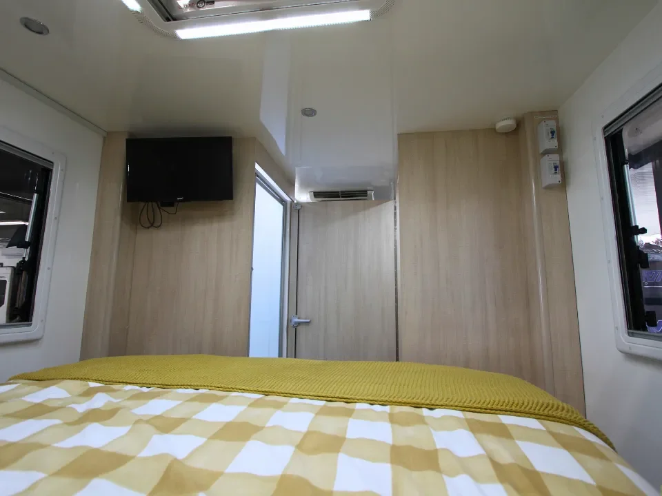 Suncamper Sovereign Q-2 bed area — sleeping