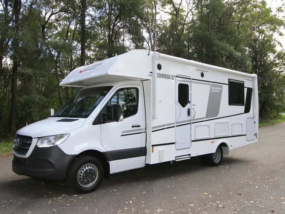 Suncamper Sovereign Q-2 passenger side front quarter — exterior