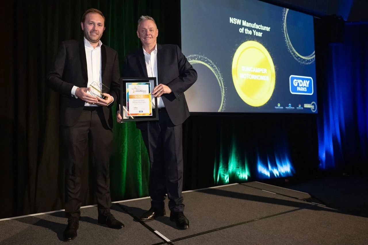 Cameron Harrison accepting NSW Manufacturer of the Year for Suncamper at the 2026 CCIA NSW Awards of Excellence