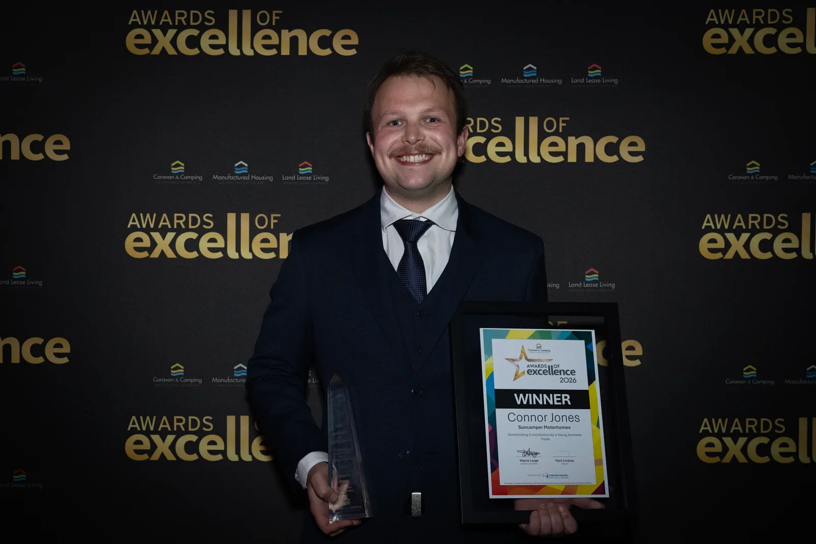 Connor Jones with the 2026 CCIA NSW Outstanding Young Achiever award and trophy